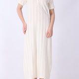 Side view of cream midi dress