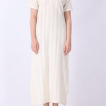 Cream pointelle dress with gold jewellery styling