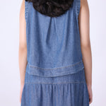 Back view of blue chambray eyelet top
