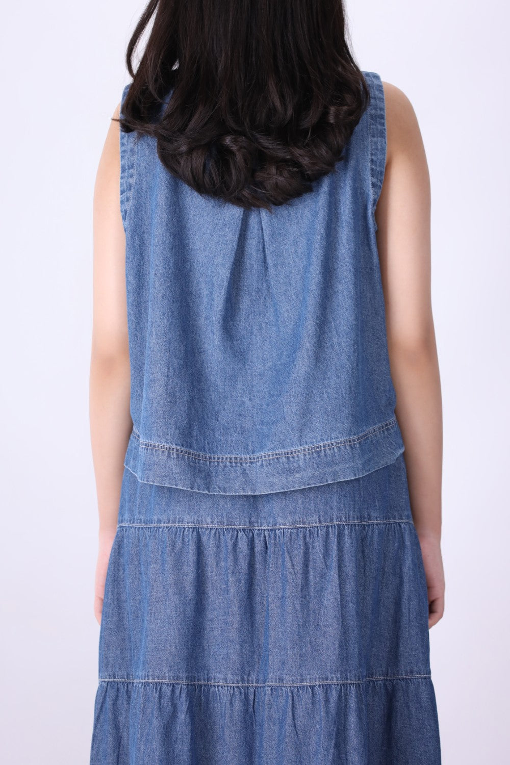 Back view of blue chambray eyelet top