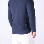 Back view of blue long sleeve shirt

