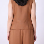 Back view of caramel tailored wrap vest
