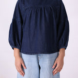 Back view of cotton denim top
