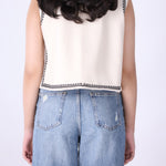 Back view of embroidered ivory vest FUMO