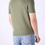 Back view of knitted t-shirt in sage green
