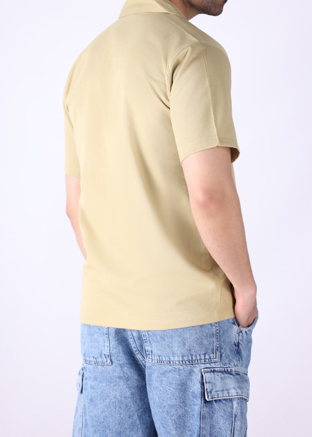 Back view of off-white Cuban collar shirt
