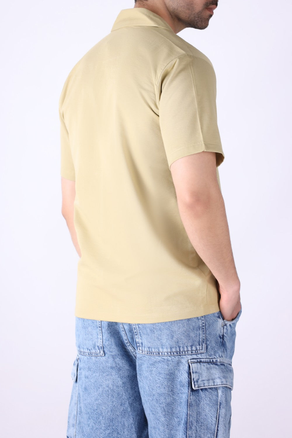 Back view of off-white Cuban collar shirt
