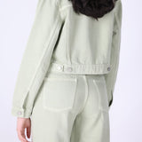 Back view of speckled green denim jacket
