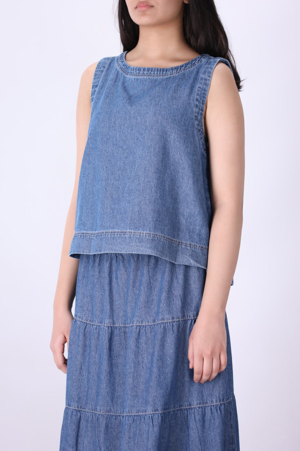 Blue chambray eyelet shell top, front view
