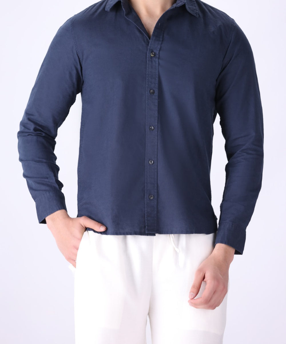 Blue shirt worn with chinos