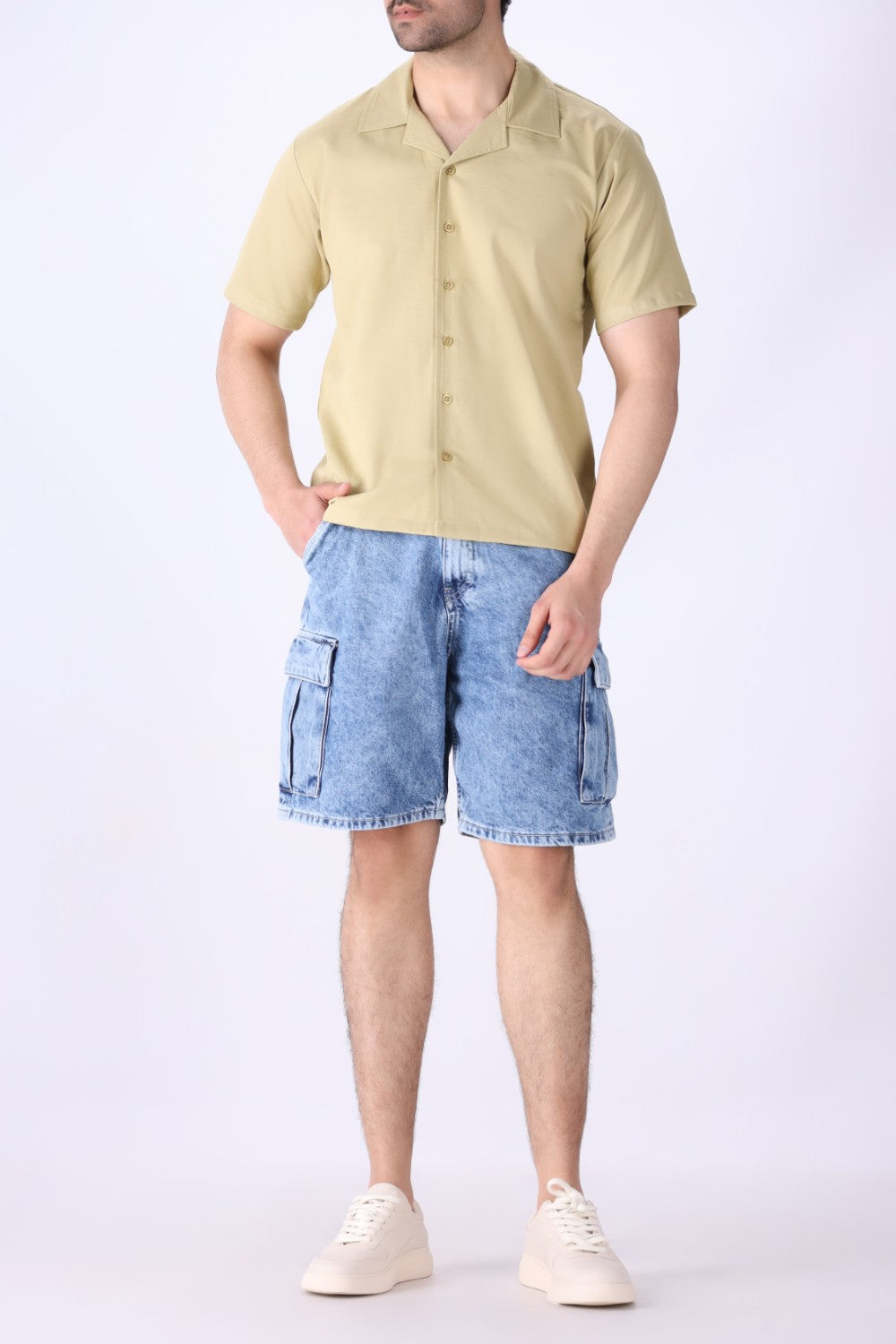 Camp collar shirt styled with tailored shorts
