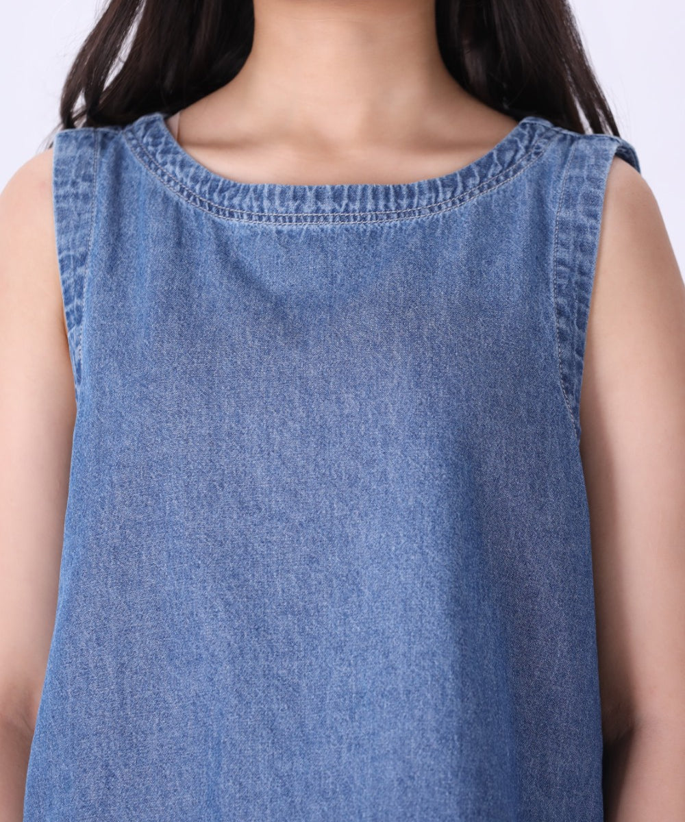 Chambray shell top layered under a blazer
