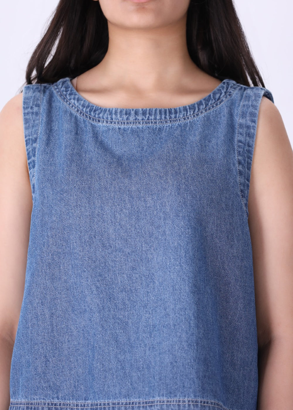 Chambray shell top layered under a blazer

