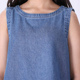 Chambray shell top layered under a blazer
