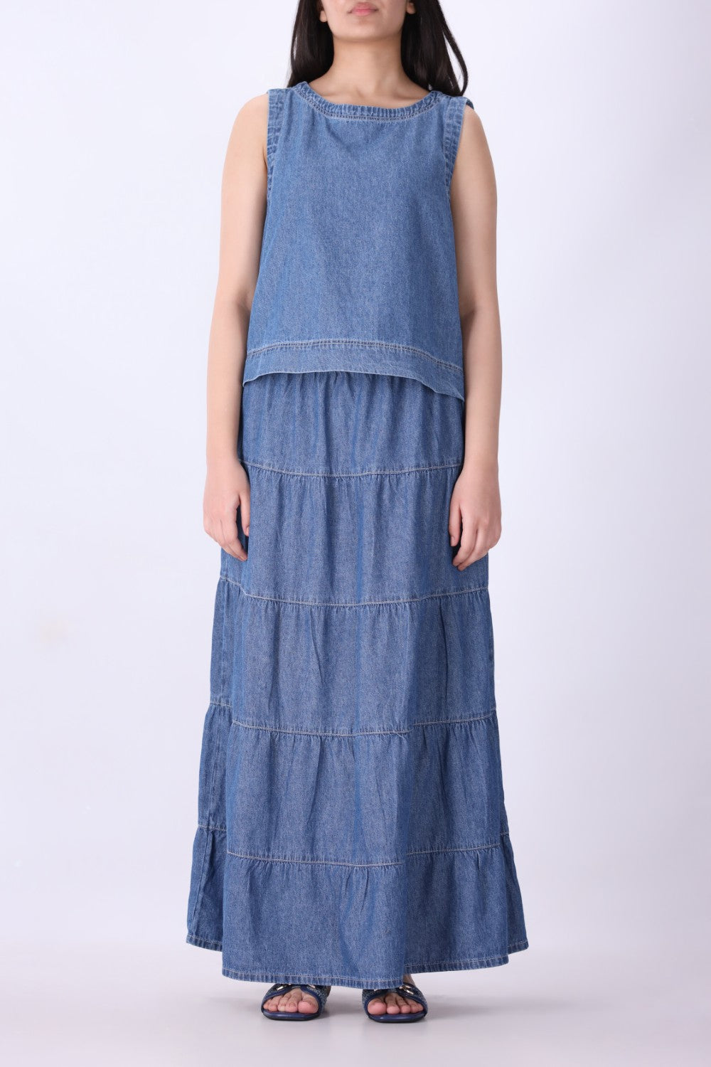 Close-up of eyelet openwork detail on chambray
