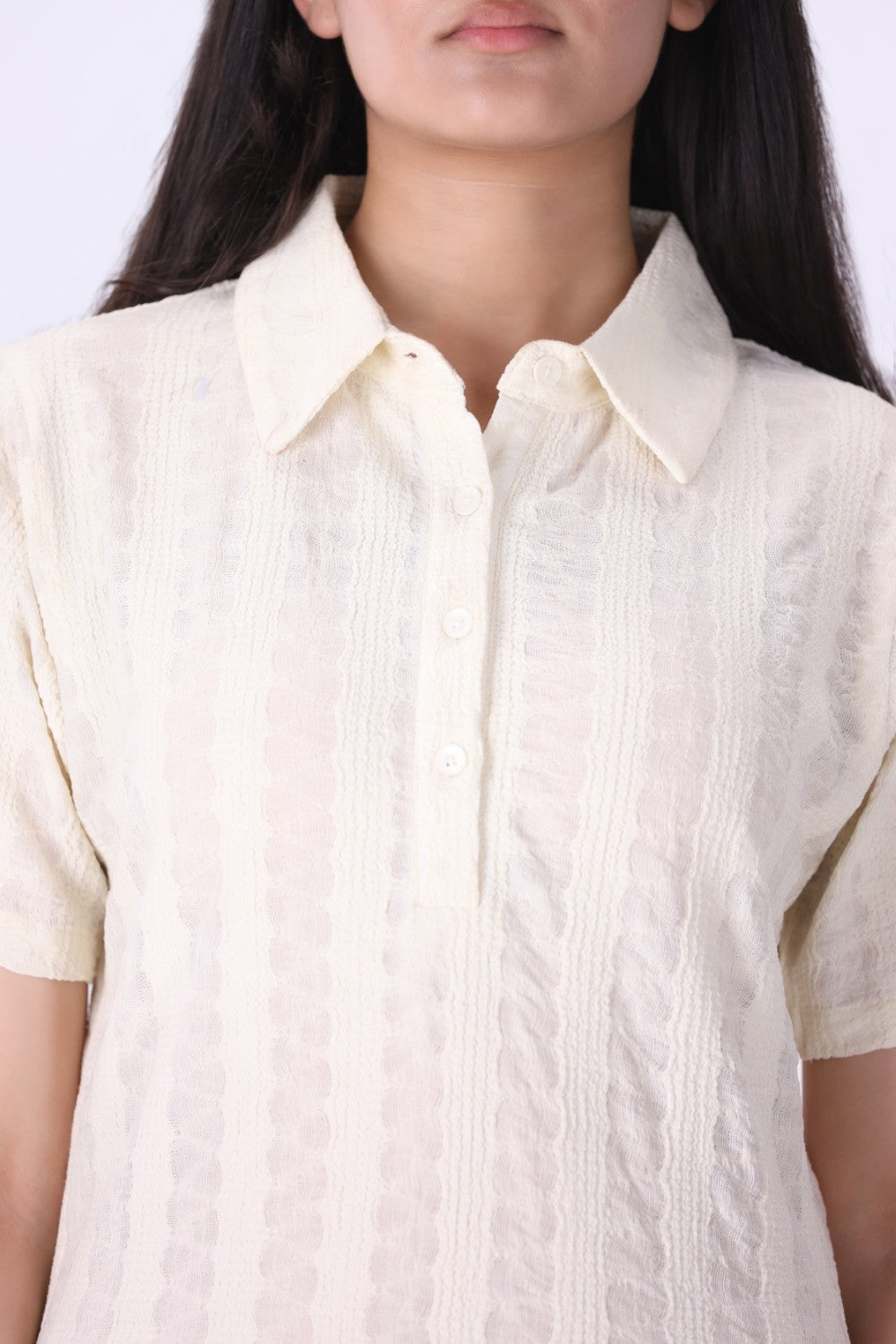 Close-up of open pointelle knit texture
