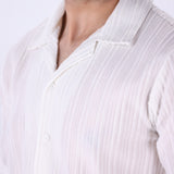 Close-up of vertical grain texture on white fabric
