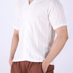 Cuban collar shirt styled with linen trousers
