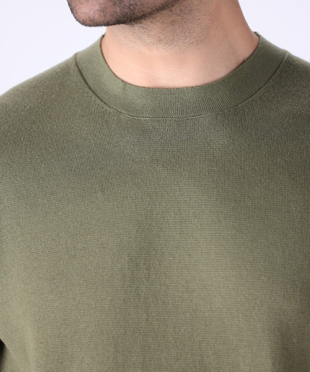 Knitted tee worn with chinos