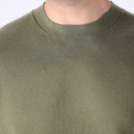 Knitted tee worn with chinos