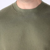 Knitted tee worn with chinos