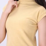 Latte high-neck vest styled with denim

