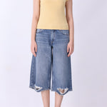 Latte knit vest with cap sleeves, side view
