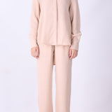 Pink long sleeve shirt styled with tailored trousers
