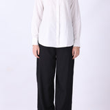 Pinstripe shirt in white styled with trousers