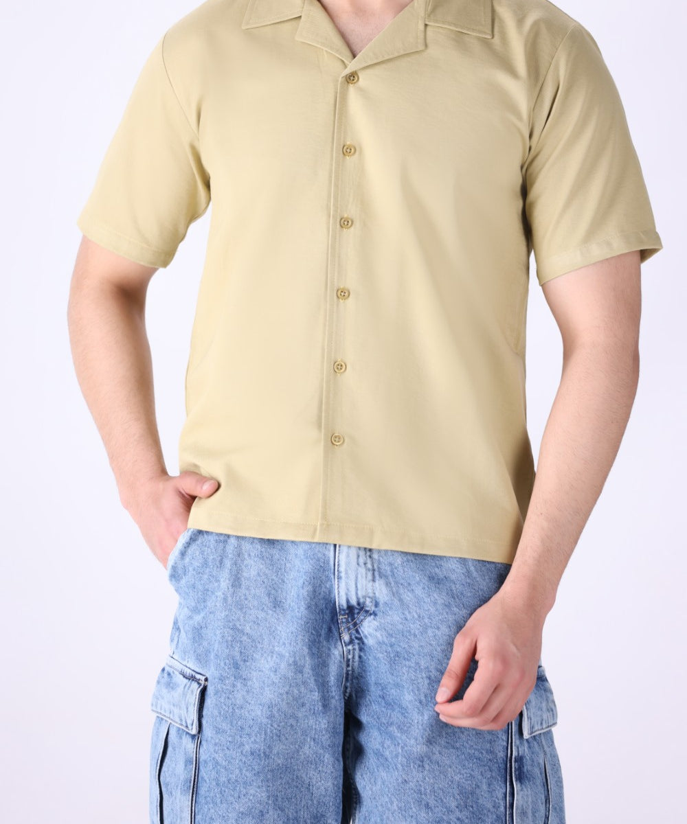 Relaxed camp collar shirt worn open over a tee
