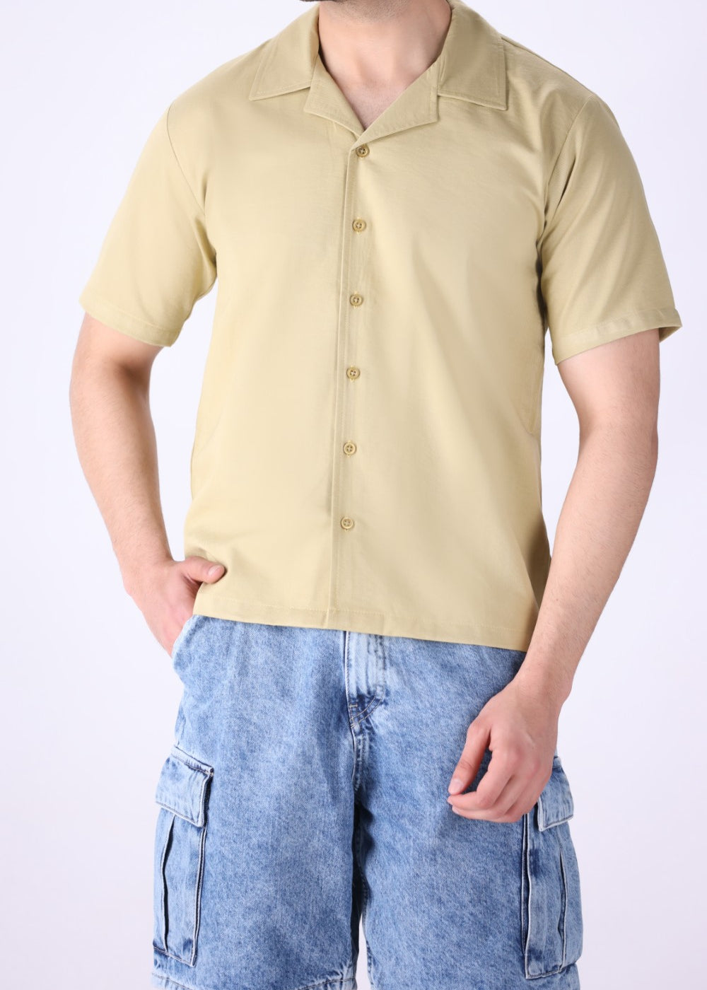 Relaxed camp collar shirt worn open over a tee
