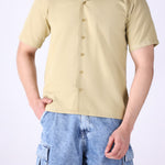 Relaxed camp collar shirt worn open over a tee

