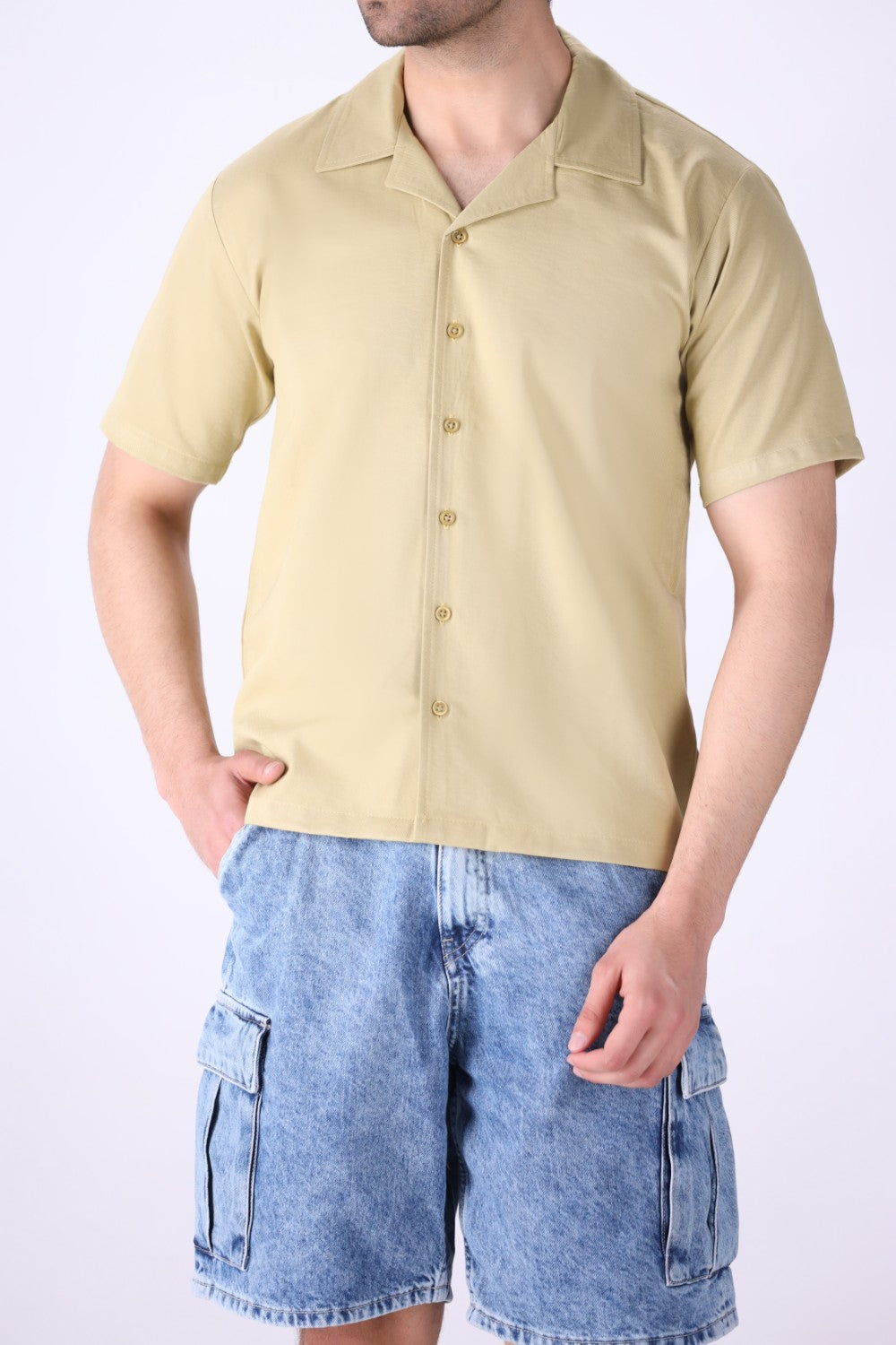 Relaxed camp collar shirt worn open over a tee
