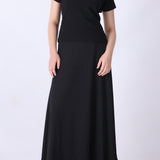 Ribbed black tee tucked into tailored trousers