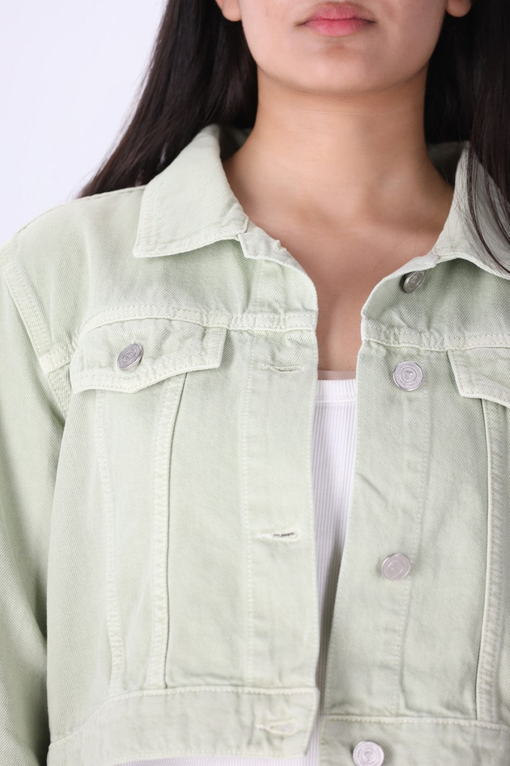 Side view of cropped denim jacket
