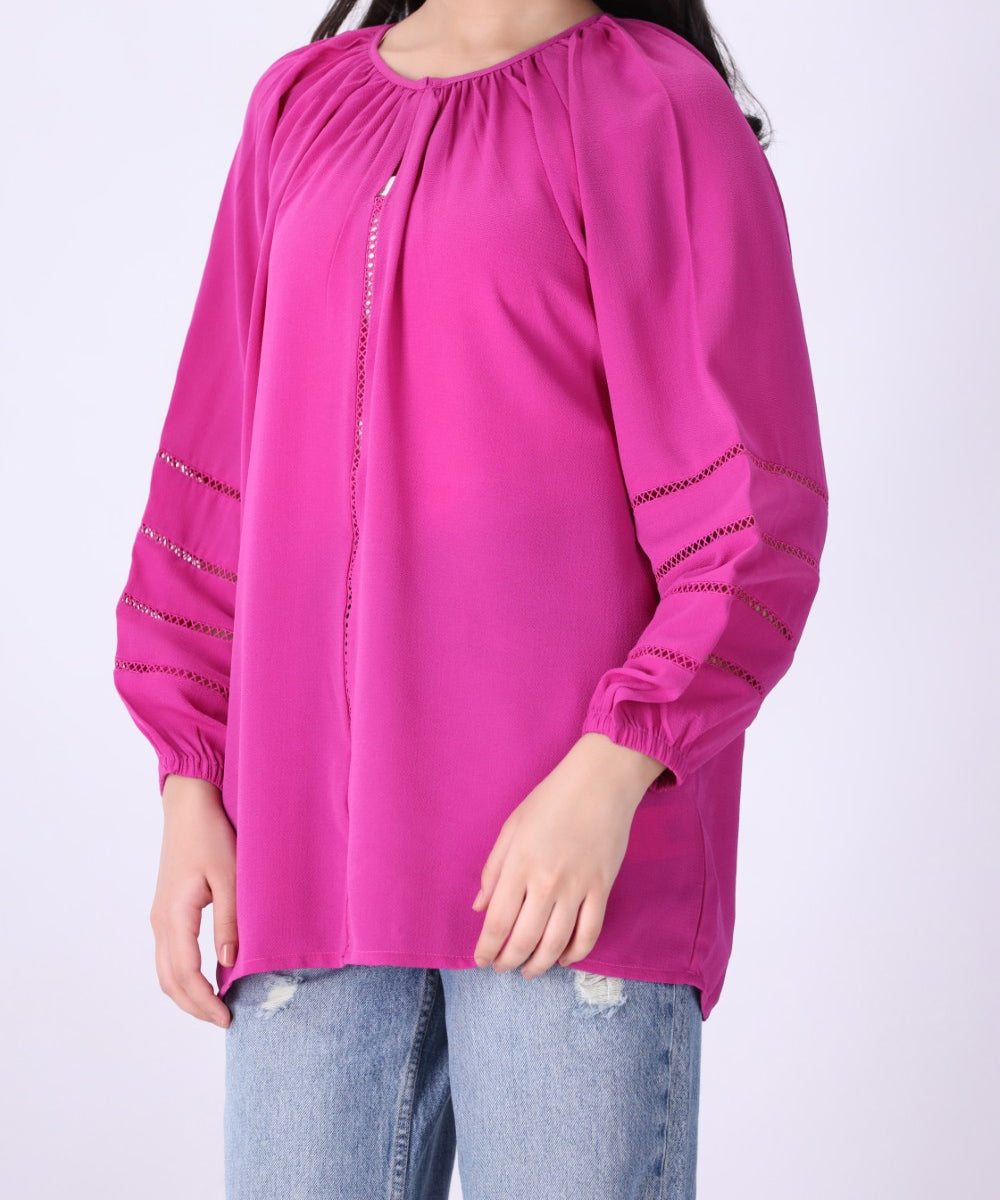 Side view of ladder-stitch blouse