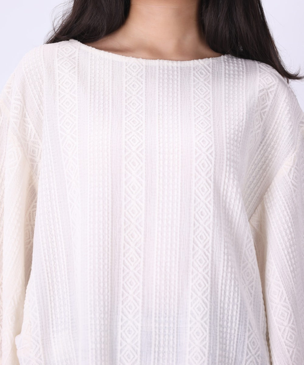 Side view of oversized batwing sleeve drape
