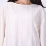 Side view of oversized batwing sleeve drape
