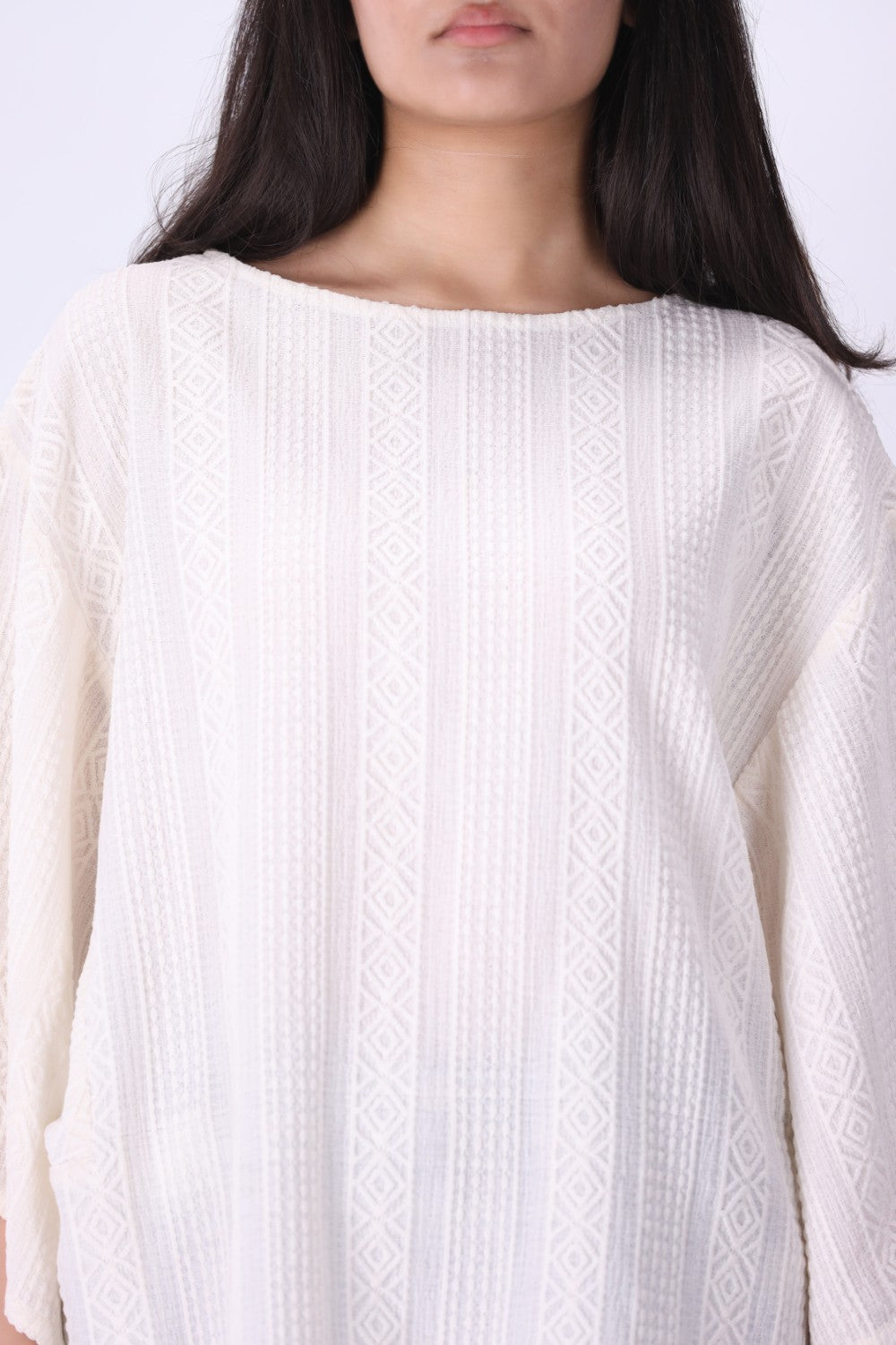 Side view of oversized batwing sleeve drape
