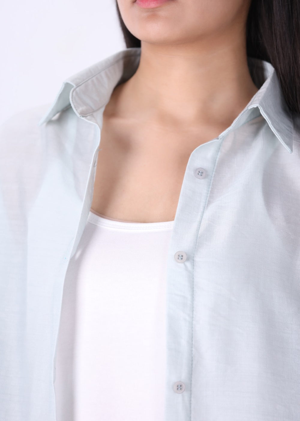 Side view of relaxed fit light blue shirt
