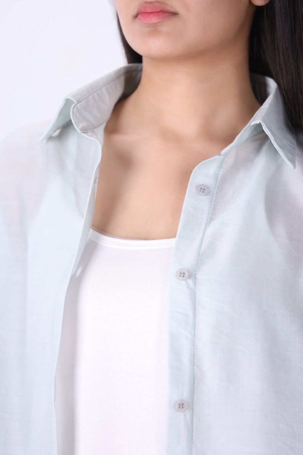 Side view of relaxed fit light blue shirt

