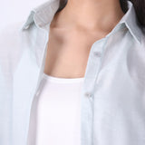 Side view of relaxed fit light blue shirt
