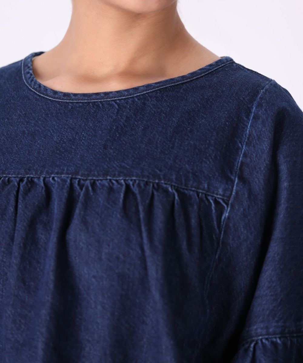 Side view of tailored denim top
