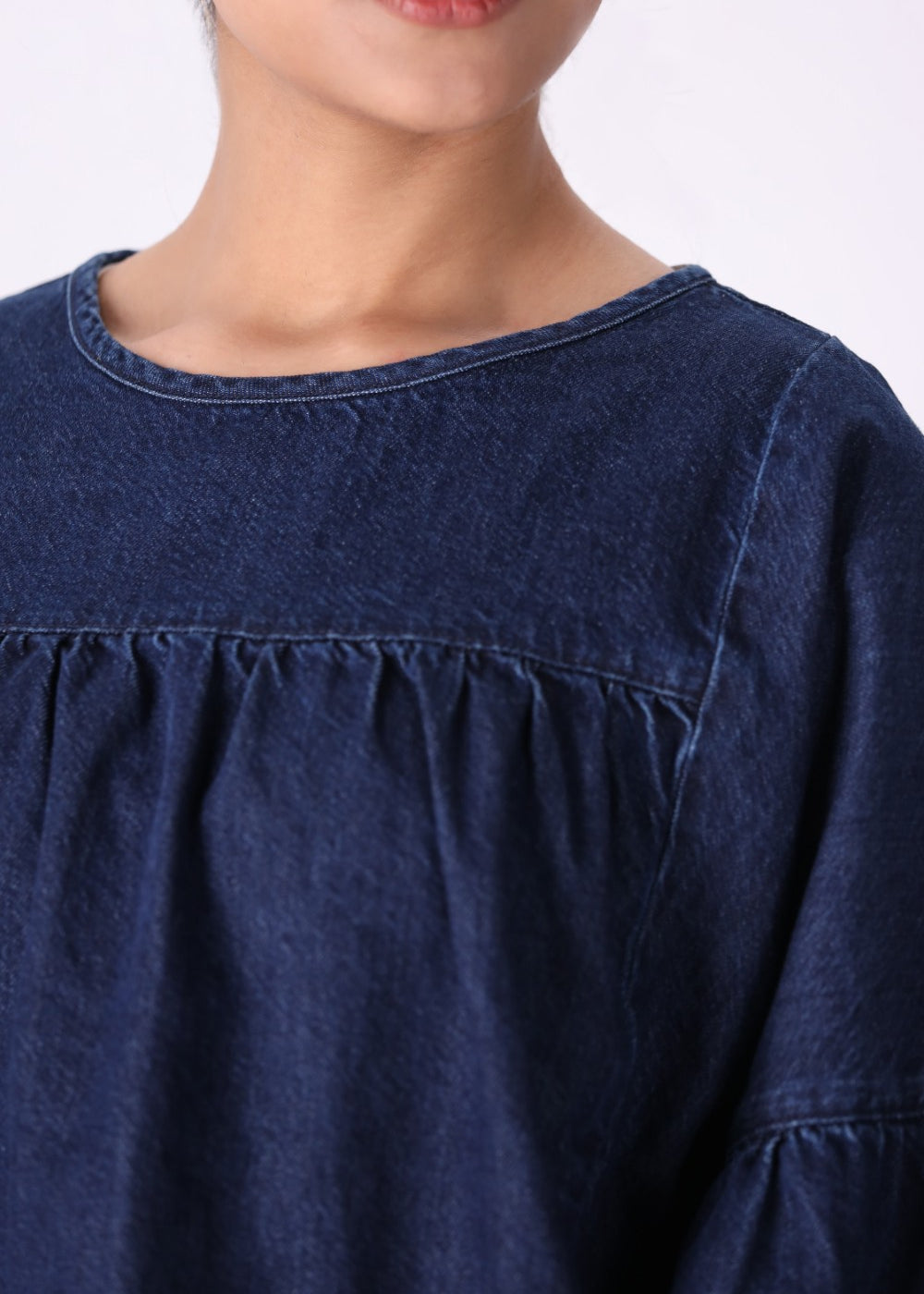 Side view of tailored denim top
