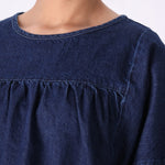 Side view of tailored denim top
