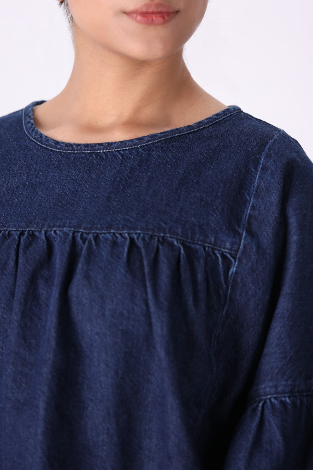 Side view of tailored denim top
