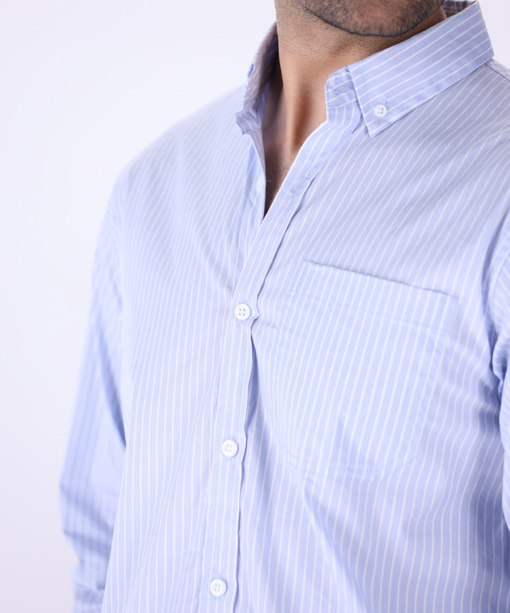Striped shirt worn with chinos
