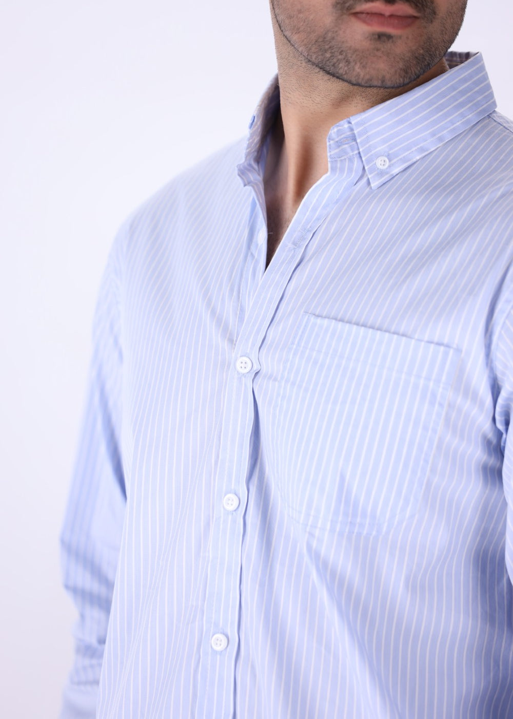 Striped shirt worn with chinos
