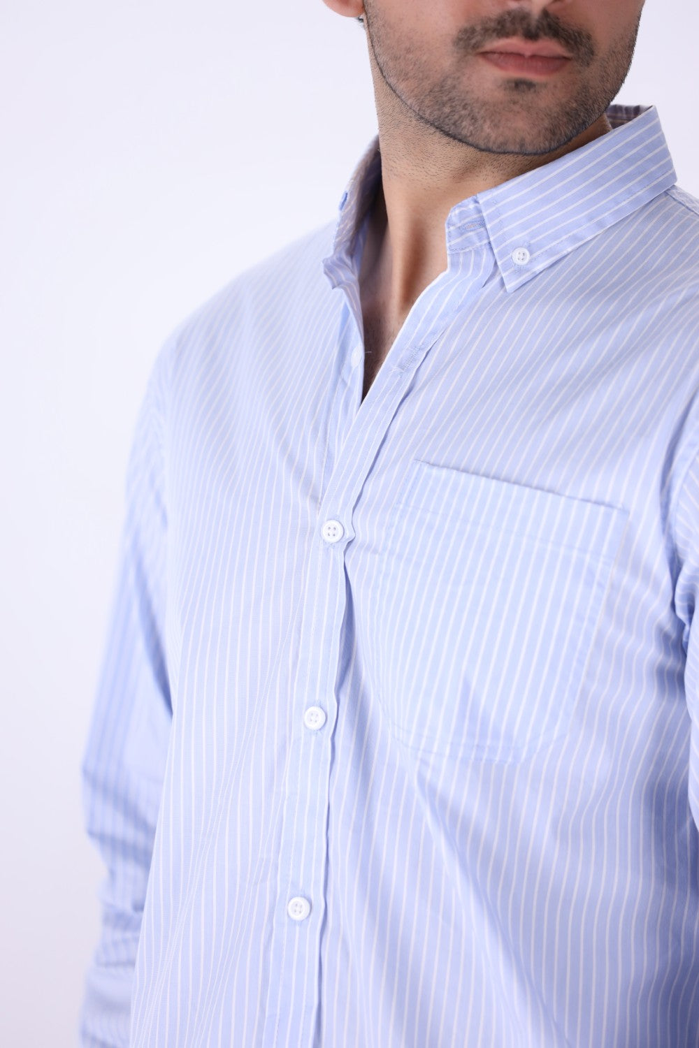 Striped shirt worn with chinos
