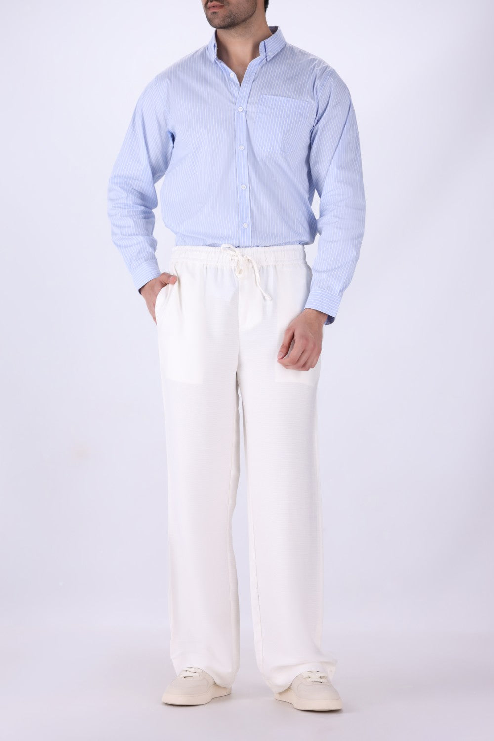 White relaxed drawstring trousers for men, front view
